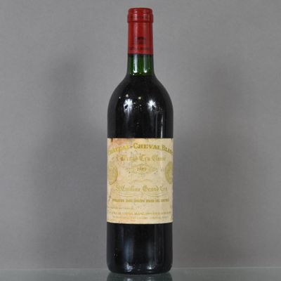 a bottle of wine that is sitting on a table