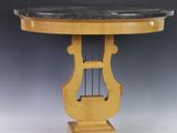 an image of a wooden table with a black marble top