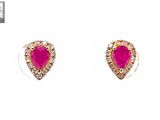 a pair of pink heart shaped earrings on a white background
