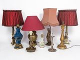 a lot of lamps that are sitting on a table