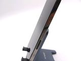 a close up of a cell phone on a stand
