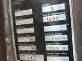 a sign on the side of a machine that says manitou bf