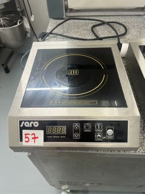 two burners that are on a counter top in a kitchen