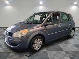 a picture of a small gray car in a room