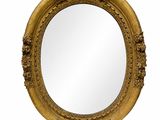 an ornate gold framed mirror on a white background