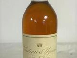 an image of a bottle of wine sitting on top of a table