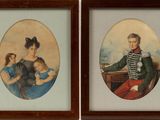 two framed portraits of a man and a woman with a child