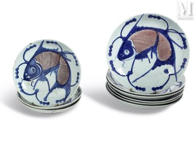 several plates with blue and white designs are stacked on top of each other