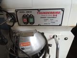 a machine that is sitting on the ground with a sign on it