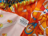 a close up of a tie with a picture on it