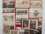 many old photographs of different cities displayed on the wall