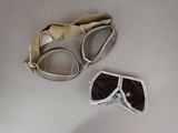 a pair of glasses and a pair of glasses on a table