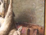 a painting of rabbits hanging from a rope with a suitcase in the background