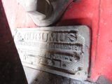 a close up of a sign on the side of a red truck