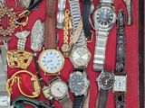 many different types of watches in a case
