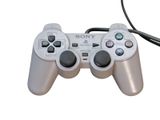 a video game controller that is connected to a charger