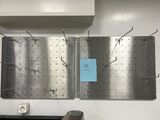 a picture of a piece of metal with a blue sticker on it