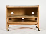 an image of a wooden tv stand with wheels