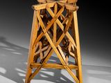 an image of a wooden table with a wooden structure on it