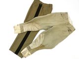 two men ' s pants with zippers on the sides of them