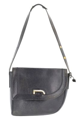 a black purse with a metal handle on a white background