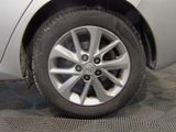 a close up of a car ' s tire on a flat surface
