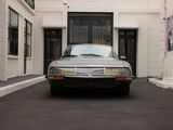 a car that is parked in front of a building