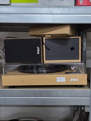 a shelf that has a lot of boxes on top of it