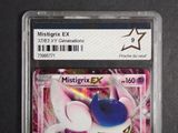 a close up of a pokemon card with a star on it
