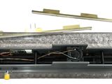 an overhead view of a metal box with wires and wires attached to it