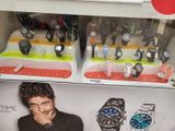 a display of watches and watches for sale in a store