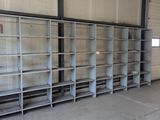 a large metal shelf in the middle of a room