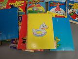 many children ' s books that are on the table