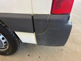 a close up of a truck with a flat tire