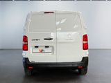 a white van that is parked in a garage