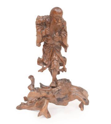 an image of a statue of a man on a horse with a bird