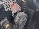 a close up of a car ' s dashboard with a radio on it