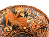 a vase that has a picture of a woman on it