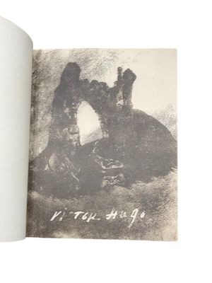 an open book with a picture of a man and a woman on it