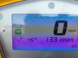 a close up of a digital display on a motorcycle