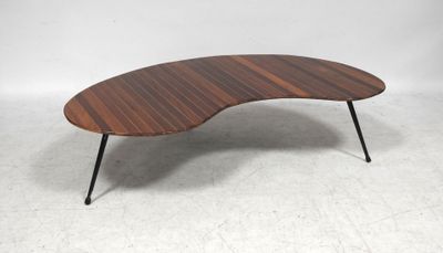 a close up of a coffee table with a wooden top