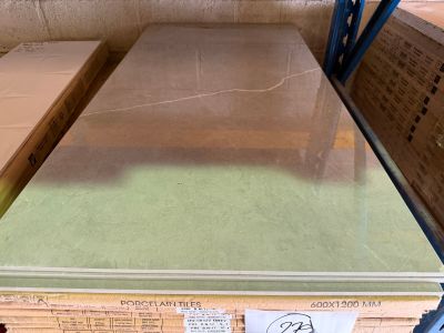 a stack of boxes and a table in a warehouse