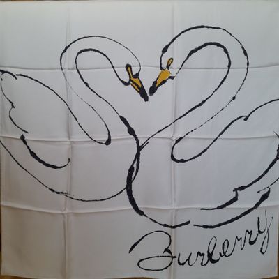 a white flag with two swans on it that says burberry