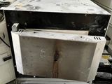 an image of a microwave oven sitting on top of a counter
