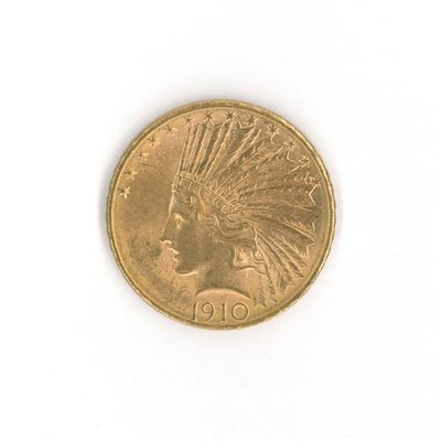 une image d'un gros plan d'une pièce de monnaie sur une surface blanche