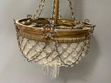 an image of a chandelier hanging from the ceiling