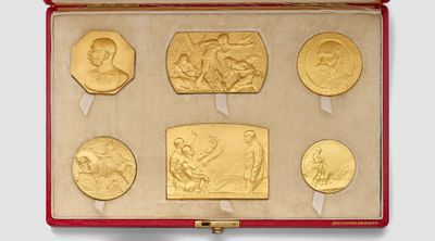 an image of a red case with gold coins in it