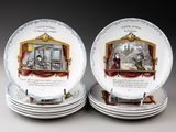 plusieurs assiettes sur lesquelles figurent les portraits d'une femme et d'un homme