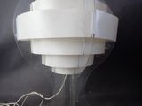 an image of a table lamp with a clear plastic cover on it