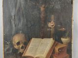 an old painting of a skull and a book on a table